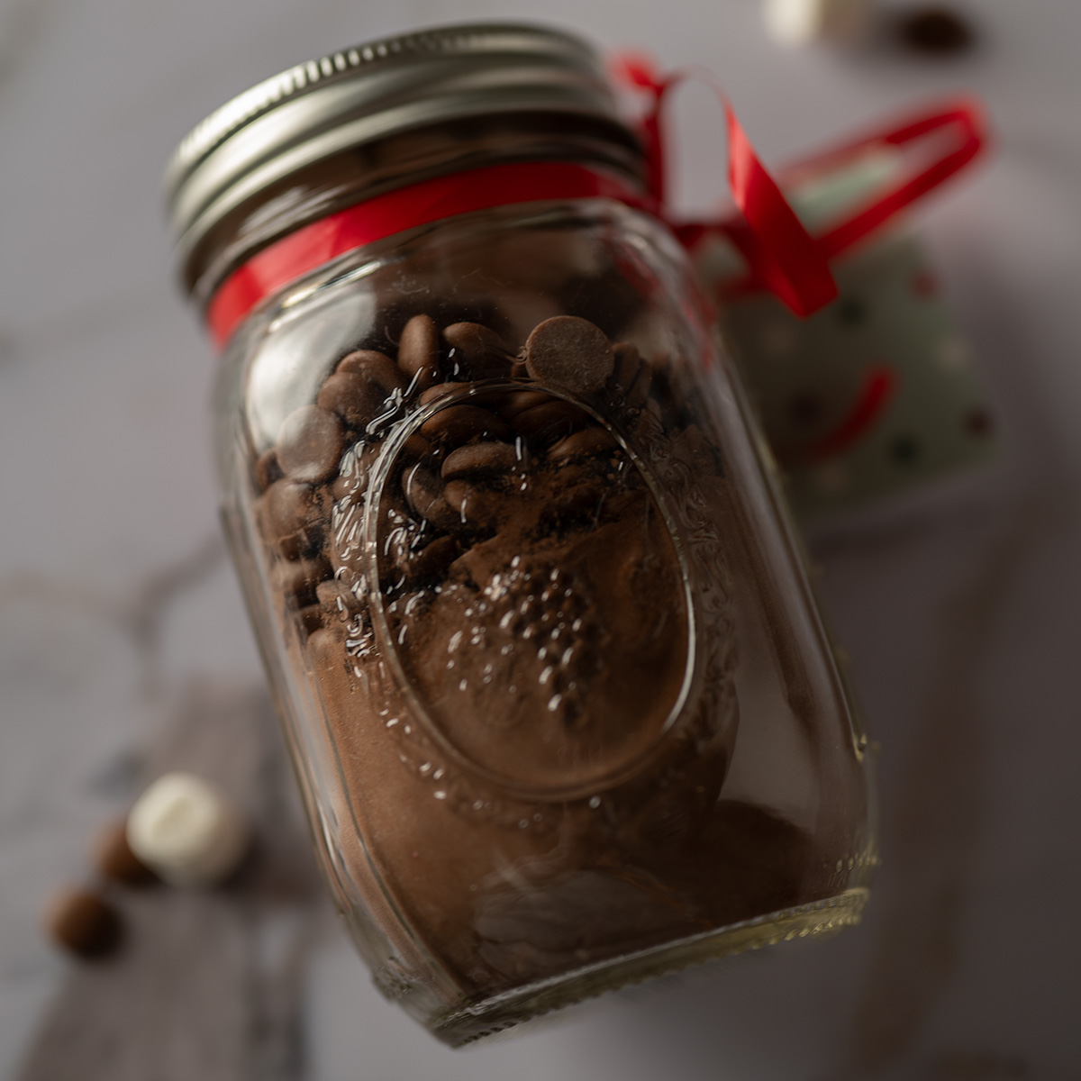 Jar of hot cocoa mix.