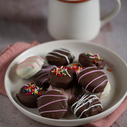 A plate of chocolate-covered Oreos.