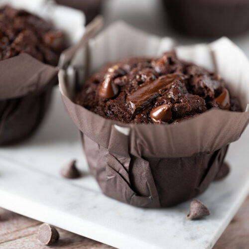 Jumbo double chocolate muffin in bakery-style wrapper.